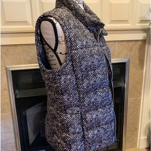Charlie Paige size medium puffer vest. Black and white. Like new.